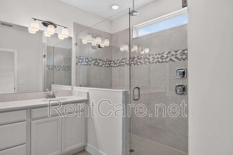 Stunning 4/3.5 home with an office and fence enclosed yard! Located at the Enclave at Hamlin and available for immediate occupancy! property image
