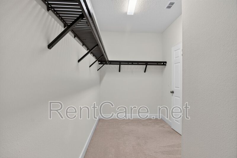 Stunning 4/3.5 home with an office and fence enclosed yard! Located at the Enclave at Hamlin and available for immediate occupancy! property image