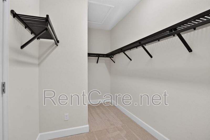 Stunning 4/3.5 home with an office and fence enclosed yard! Located at the Enclave at Hamlin and available for immediate occupancy! property image