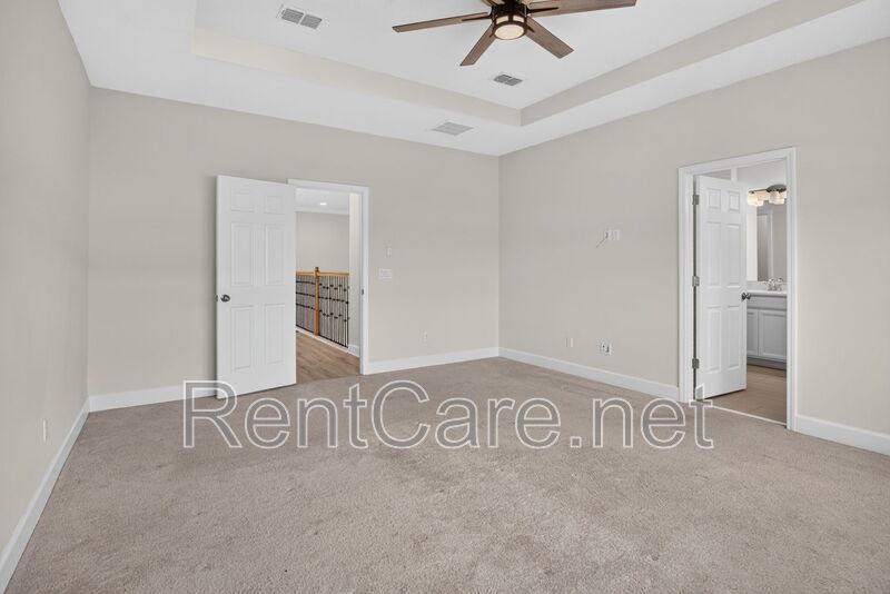 Stunning 4/3.5 home with an office and fence enclosed yard! Located at the Enclave at Hamlin and available for immediate occupancy! property image