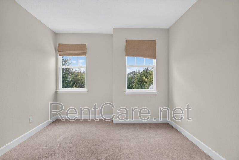 Stunning 4/3.5 home with an office and fence enclosed yard! Located at the Enclave at Hamlin and available for immediate occupancy! property image