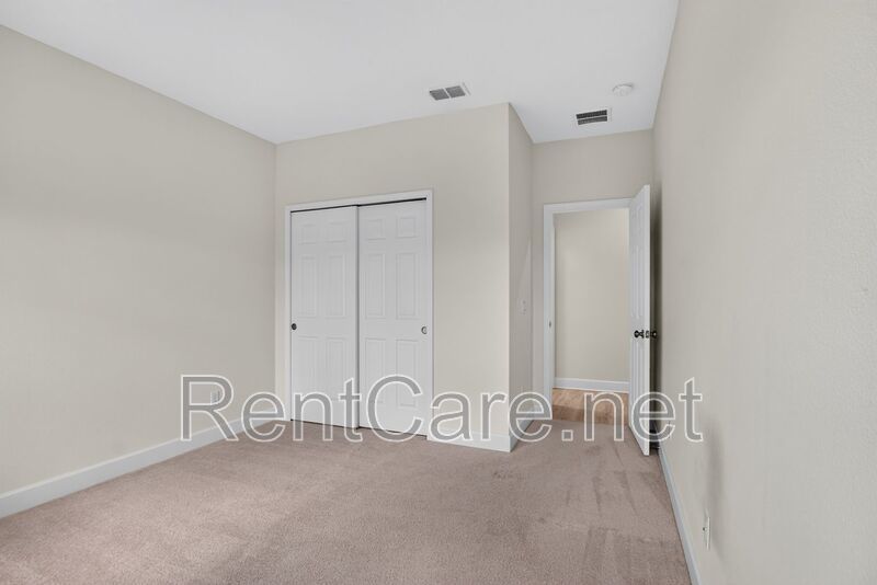 Stunning 4/3.5 home with an office and fence enclosed yard! Located at the Enclave at Hamlin and available for immediate occupancy! property image