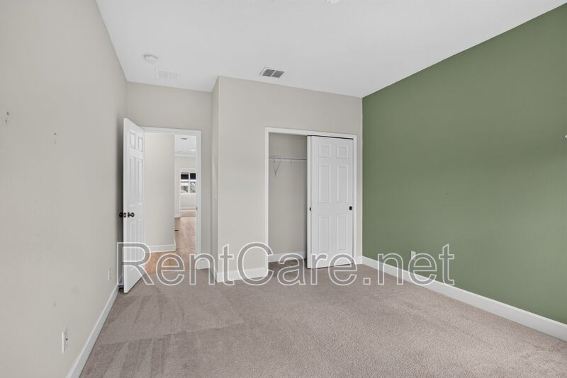 Stunning 4/3.5 home with an office and fence enclosed yard! Located at the Enclave at Hamlin and available for immediate occupancy! property image