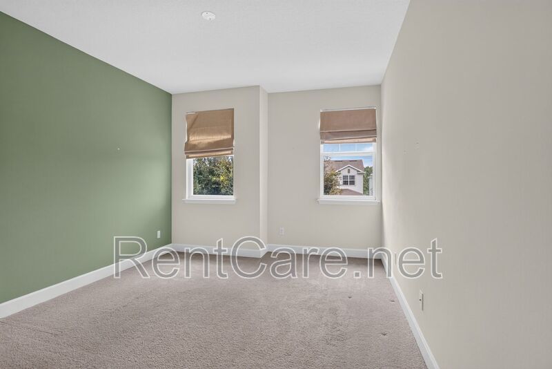 Stunning 4/3.5 home with an office and fence enclosed yard! Located at the Enclave at Hamlin and available for immediate occupancy! property image