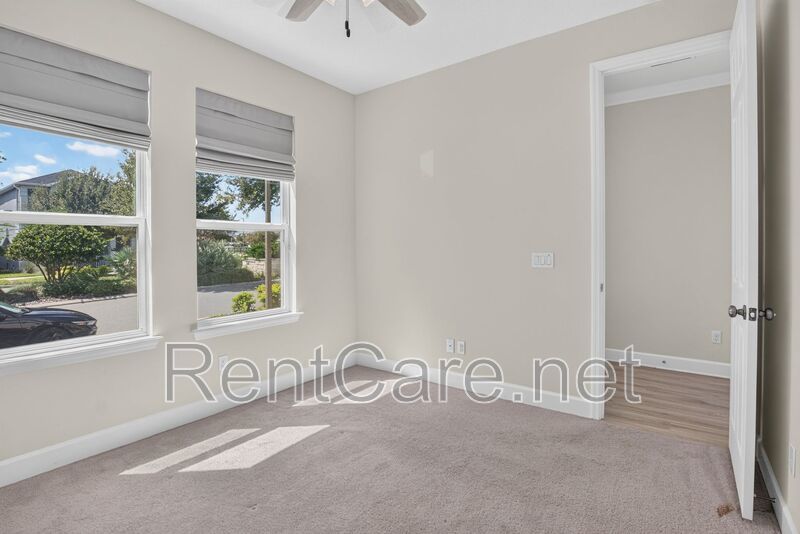 Stunning 4/3.5 home with an office and fence enclosed yard! Located at the Enclave at Hamlin and available for immediate occupancy! property image