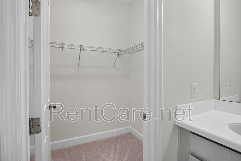 Stunning 4/3.5 home with an office and fence enclosed yard! Located at the Enclave at Hamlin and available for immediate occupancy! property image