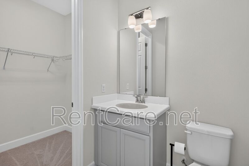 Stunning 4/3.5 home with an office and fence enclosed yard! Located at the Enclave at Hamlin and available for immediate occupancy! property image