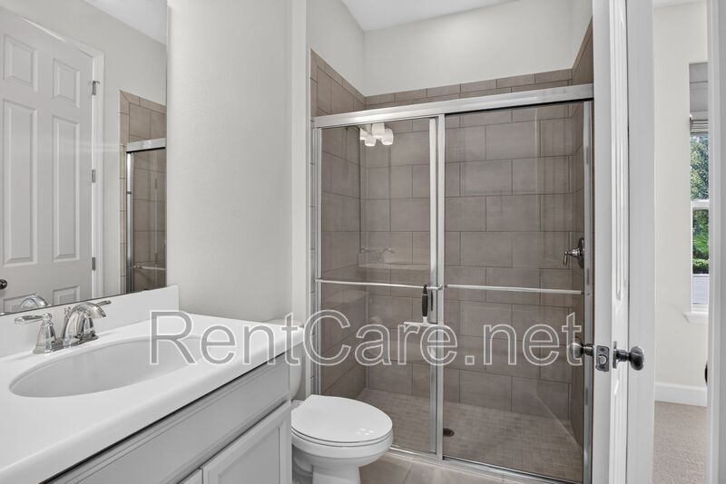 Stunning 4/3.5 home with an office and fence enclosed yard! Located at the Enclave at Hamlin and available for immediate occupancy! property image
