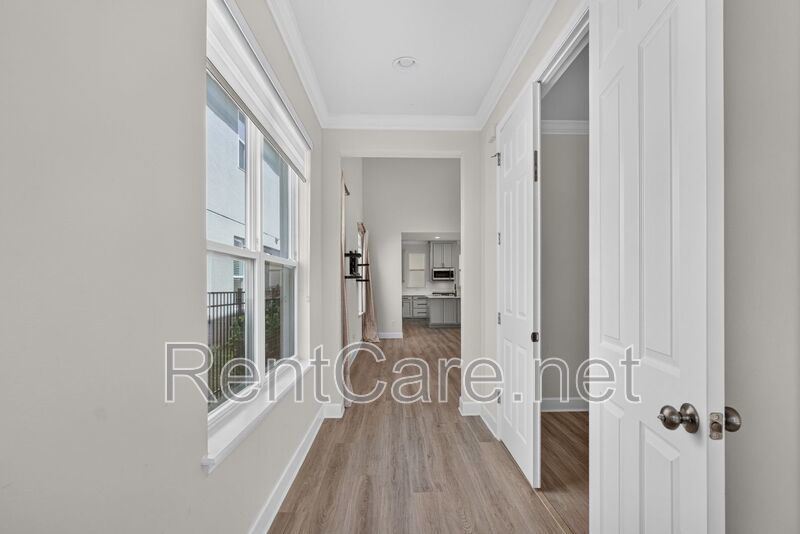Stunning 4/3.5 home with an office and fence enclosed yard! Located at the Enclave at Hamlin and available for immediate occupancy! property image