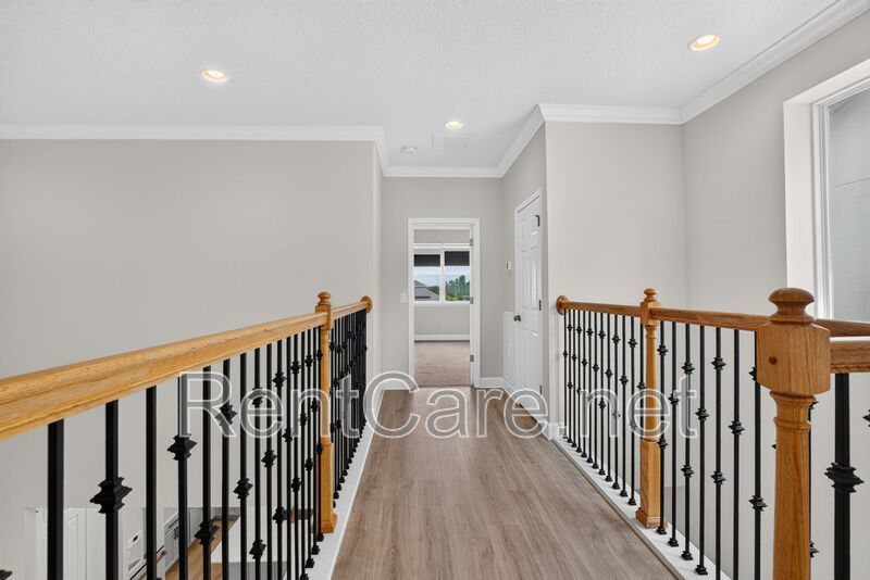 Stunning 4/3.5 home with an office and fence enclosed yard! Located at the Enclave at Hamlin and available for immediate occupancy! property image