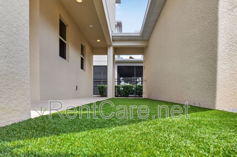 Stunning 4/3.5 home with an office and fence enclosed yard! Located at the Enclave at Hamlin and available for immediate occupancy! property image