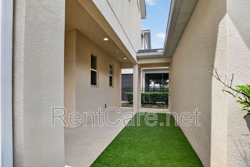 Stunning 4/3.5 home with an office and fence enclosed yard! Located at the Enclave at Hamlin and available for immediate occupancy! property image