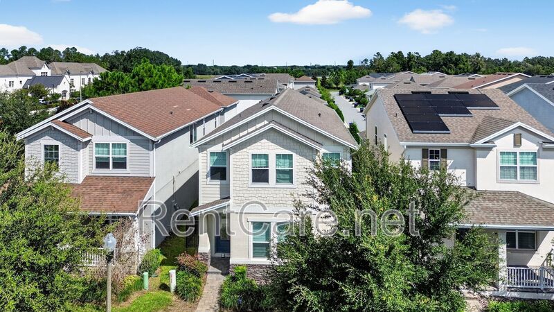 Stunning 4/3.5 home with an office and fence enclosed yard! Located at the Enclave at Hamlin and available for immediate occupancy! property image