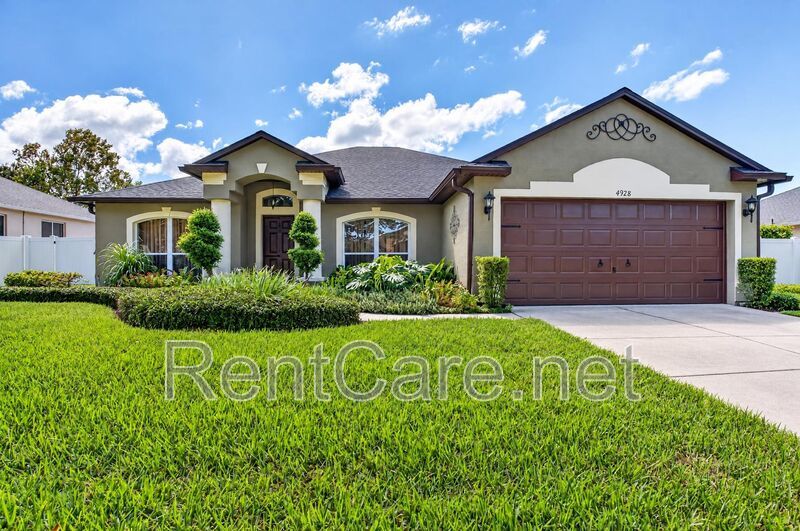 Gorgeous 4/2 Tuscan Inspired Home with Private Pool and Fence Enclosed Yard! St. Cloud near Lake Nona District! property image