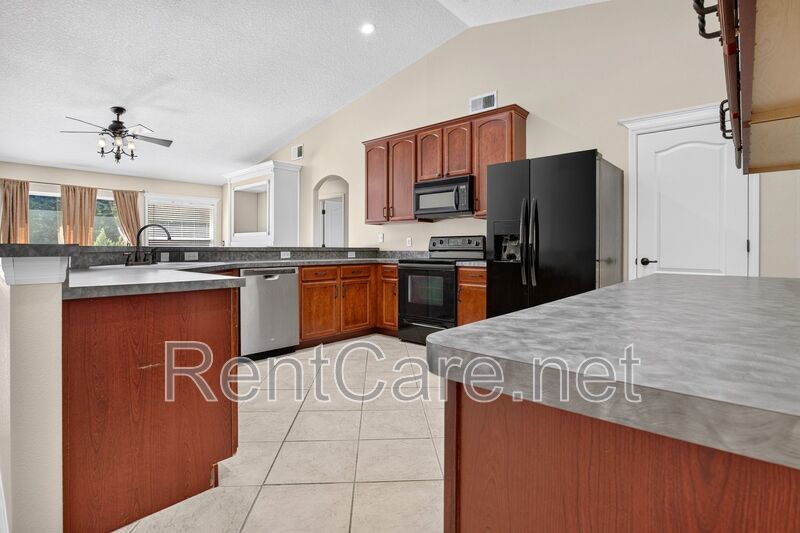 Gorgeous 4/2 Tuscan Inspired Home with Private Pool and Fence Enclosed Yard! St. Cloud near Lake Nona District! property image