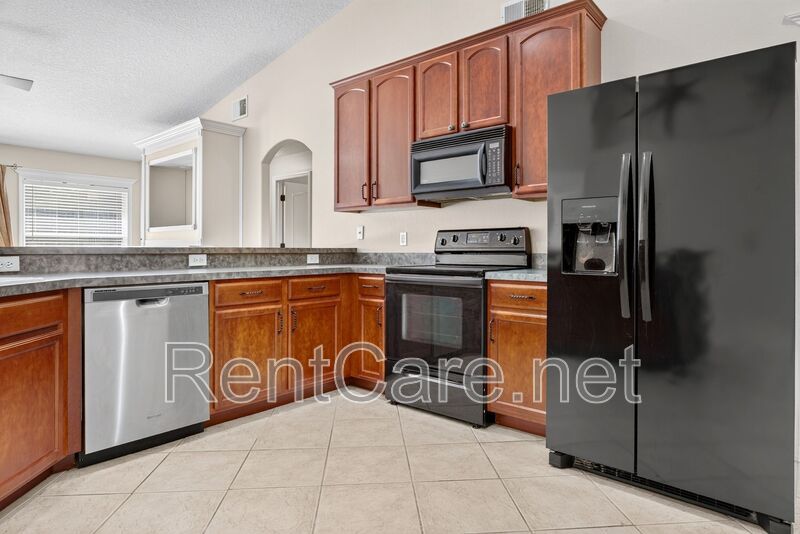 Gorgeous 4/2 Tuscan Inspired Home with Private Pool and Fence Enclosed Yard! St. Cloud near Lake Nona District! property image