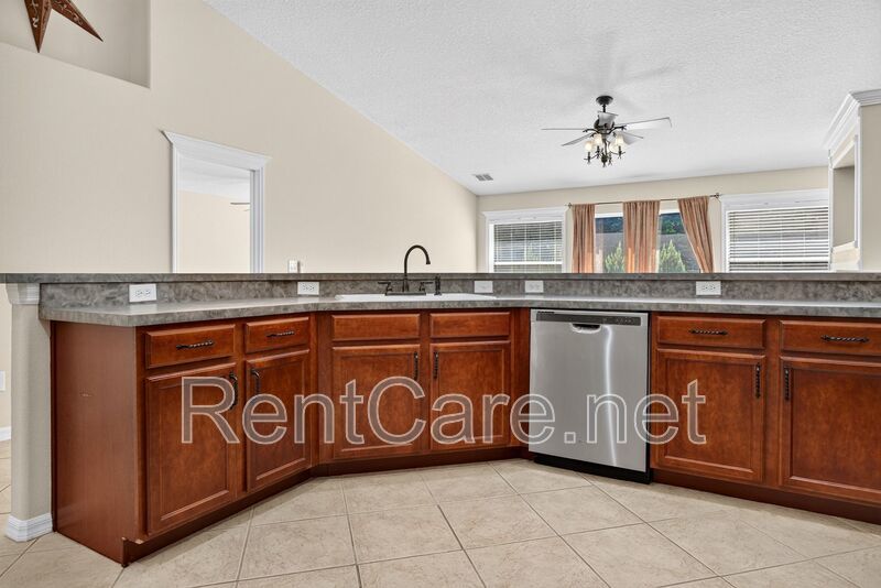 Gorgeous 4/2 Tuscan Inspired Home with Private Pool and Fence Enclosed Yard! St. Cloud near Lake Nona District! property image