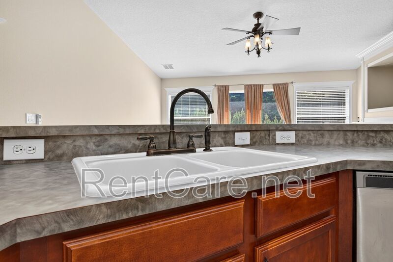Gorgeous 4/2 Tuscan Inspired Home with Private Pool and Fence Enclosed Yard! St. Cloud near Lake Nona District! property image