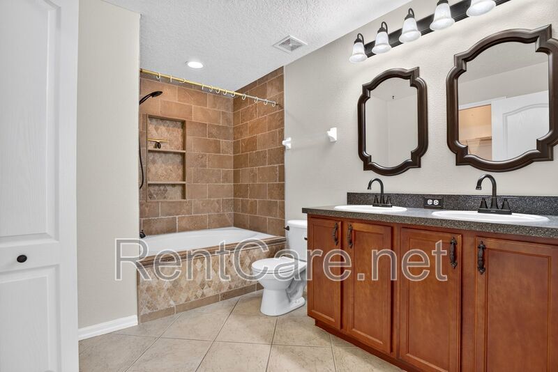 Gorgeous 4/2 Tuscan Inspired Home with Private Pool and Fence Enclosed Yard! St. Cloud near Lake Nona District! property image