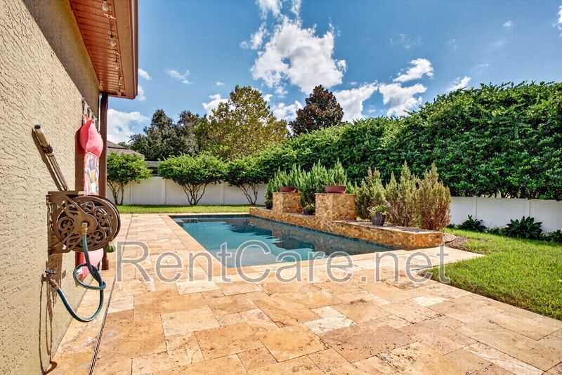 Gorgeous 4/2 Tuscan Inspired Home with Private Pool and Fence Enclosed Yard! St. Cloud near Lake Nona District! property image