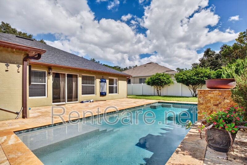 Gorgeous 4/2 Tuscan Inspired Home with Private Pool and Fence Enclosed Yard! St. Cloud near Lake Nona District! property image