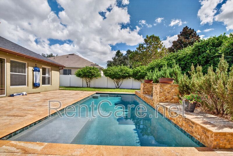 Gorgeous 4/2 Tuscan Inspired Home with Private Pool and Fence Enclosed Yard! St. Cloud near Lake Nona District! property image